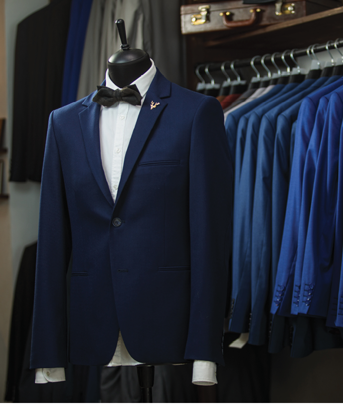 Stylish men's suit. Men's jacket on a mannequin. Men's Clothing. Mannequins in the window of the boutique. Clothing store. Shopping in boutiques.