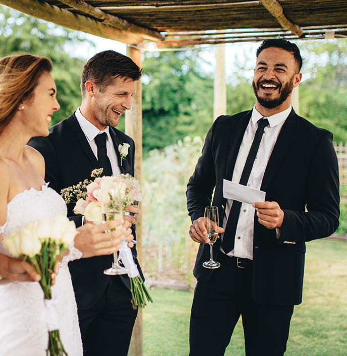 Best man giving speech to newlywed couple at wedding reception  Group of friends gathering for wedding reception 