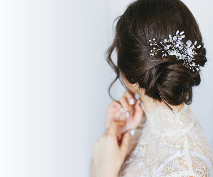 Wedding stylish hairstyle with accessories  Elegant brunette bride back with collected up do hair  