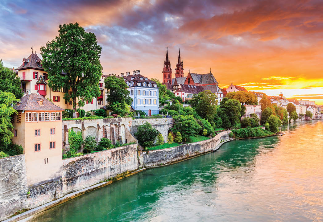 Basel, Switzerland  Old town with red stone Munster cathedral on the Rhine river 