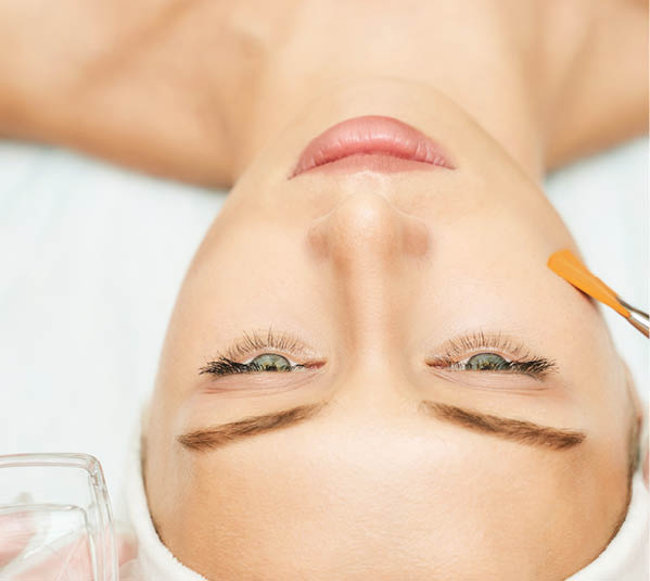 Portrait of moisturizing mask for medical design. Woman skin procedure. Natural cosmetic products. Beauty face. Facial cosmetology treatment. Healthcare peeling cream. Apply to female neck