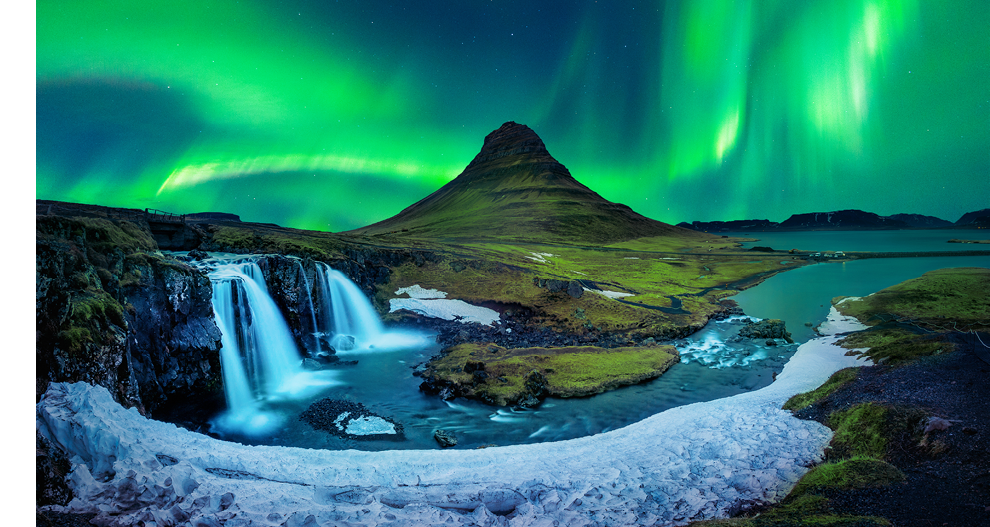 Northern Light, Aurora borealis at Kirkjufell in Iceland. Kirkjufell mountains in winter.