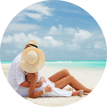 Happy honeymoon vacation at Paradise  Couple relax on the white sand of beach  Happy sea lifestyle  Young family, man and woman rest on the beach of ocean  Couple in love travel to island  Love travel