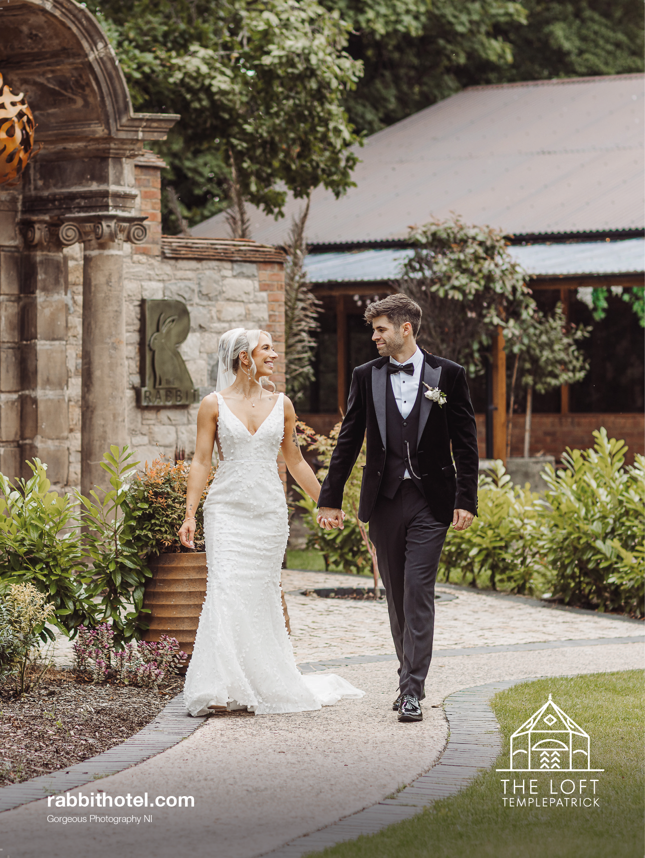 A bride and groom walking down a path. Description generated by AI
