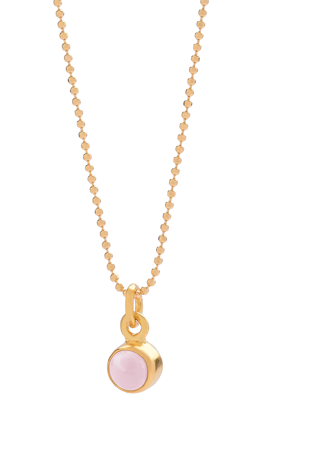 A gold chain with a pendant. Description generated by AI