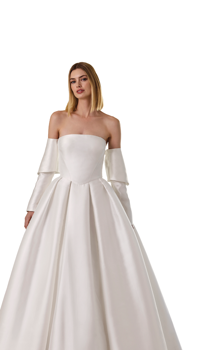 A woman in a white dress. Description generated by AI