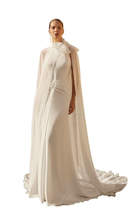 A woman wearing a white dress. Description generated by AI