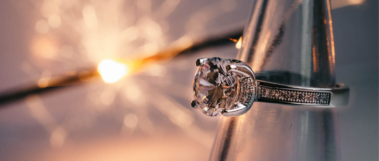 A ring with a diamond on it. Description generated by AI