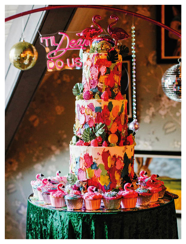 A green table with a cake on it. Description generated by AI