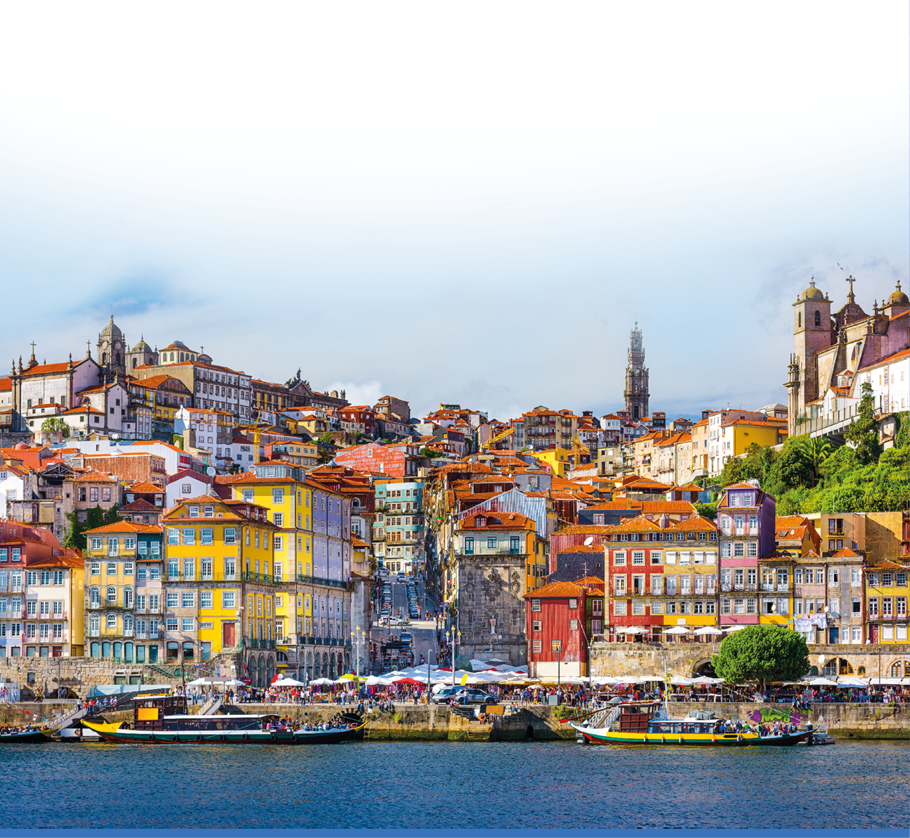 A cityscape with a large body of water and a bridge. Description generated by AI