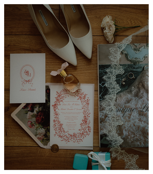 A pair of white shoes, a box of tissues, and a book on a wooden floor. Description generated by AI