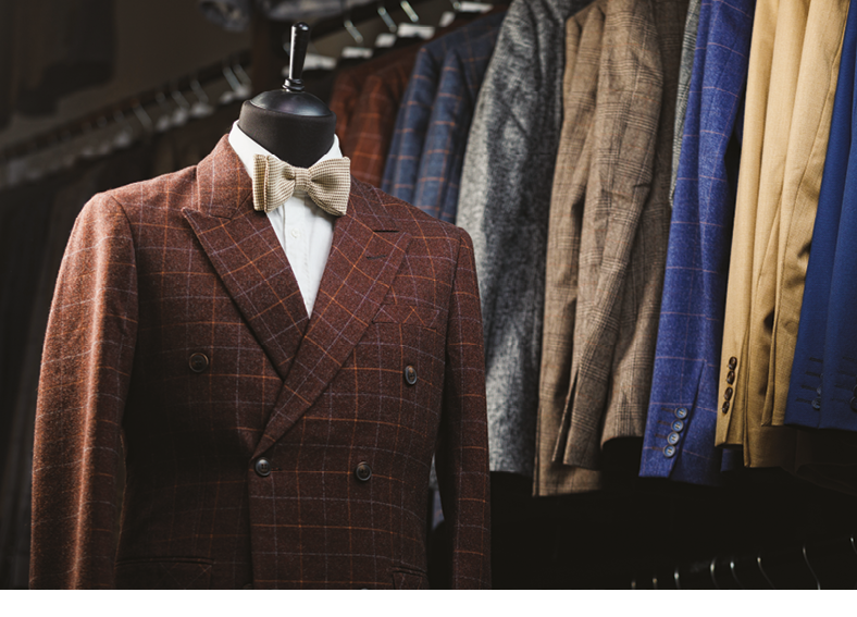 men's suit, shirt, tie on a mannequin in the store