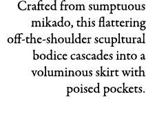 Crafted from sumptuous mikado, this flattering off the shoulder scupltural bodice cascades into a voluminous skirt wi...