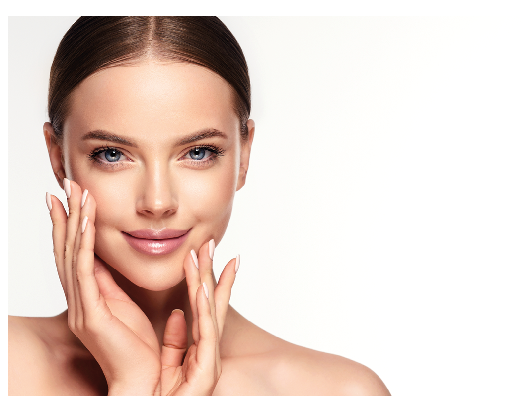 Beautiful young woman with clean fresh skin on face . Girl facial treatment   . Cosmetology , beauty  and spa .