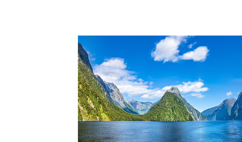 Milford Sound, National Park Fjordland, South Island, New Zealand, Oceania. Panoramic view of the mountains in the National Park Fjordland, Milford Sound.