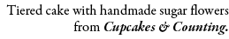 Tiered cake with handmade sugar flowers from Cupcakes & Counting.