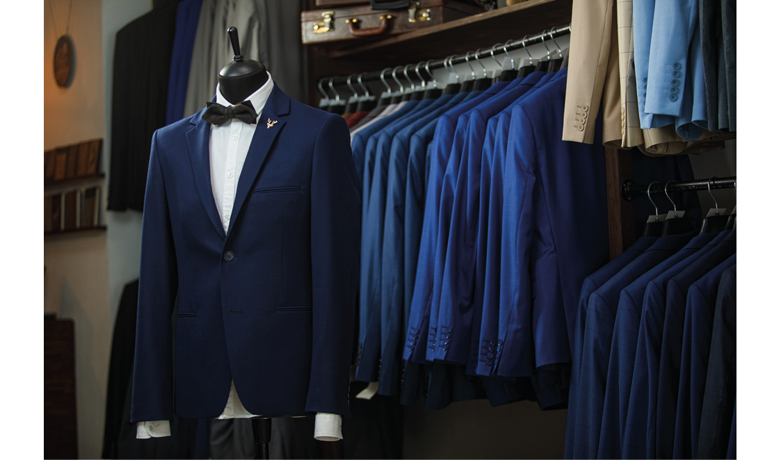 Stylish men's suit. Men's jacket on a mannequin. Men's Clothing. Mannequins in the window of the boutique. Clothing store. Shopping in boutiques.