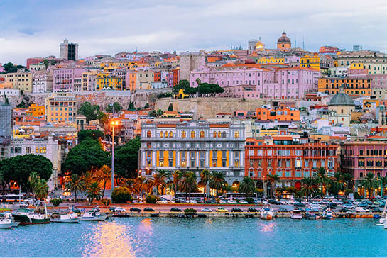 Cityscape with marina in the Mediterranian sea in the evening, Cagliari, Sardinia, Italy