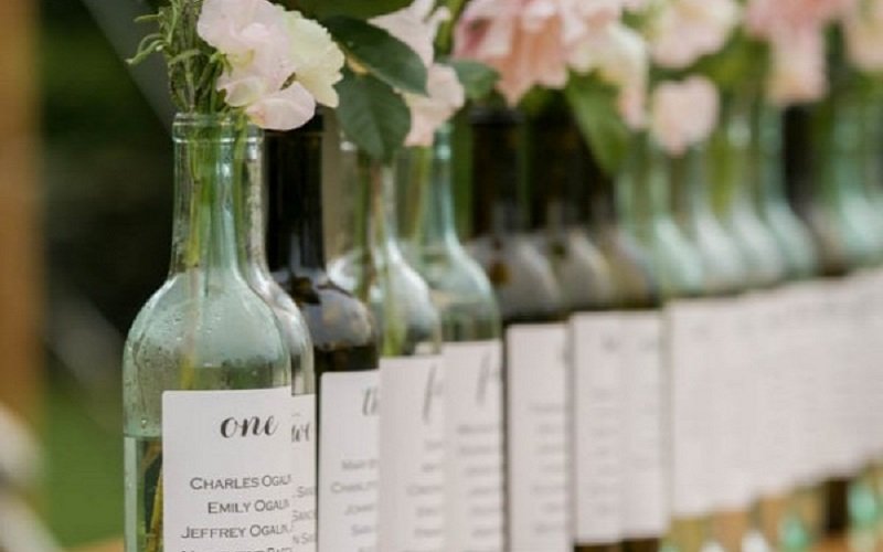 12 ways old wine bottles can be used as wedding decor Wedding Journal