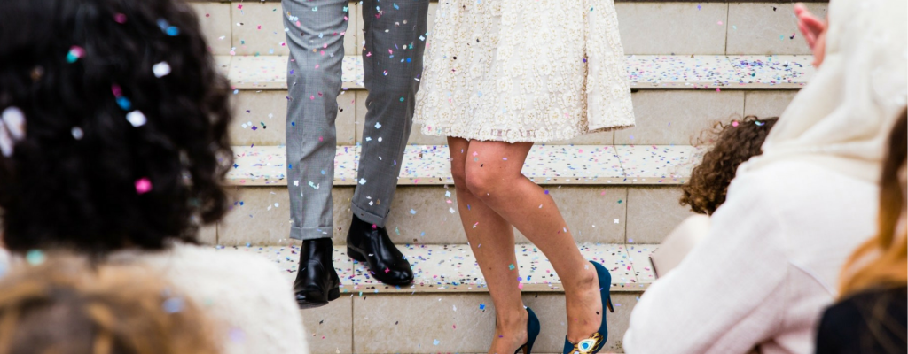 bride and groom on steps