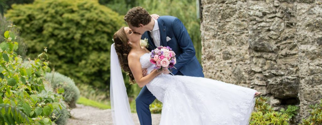 bride and groom kissing