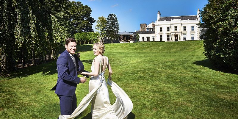 bride and groom in front of Galgorm 2