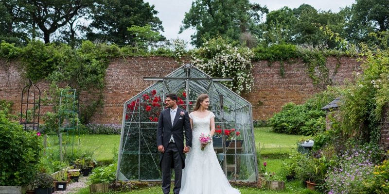 bride and groom in garden