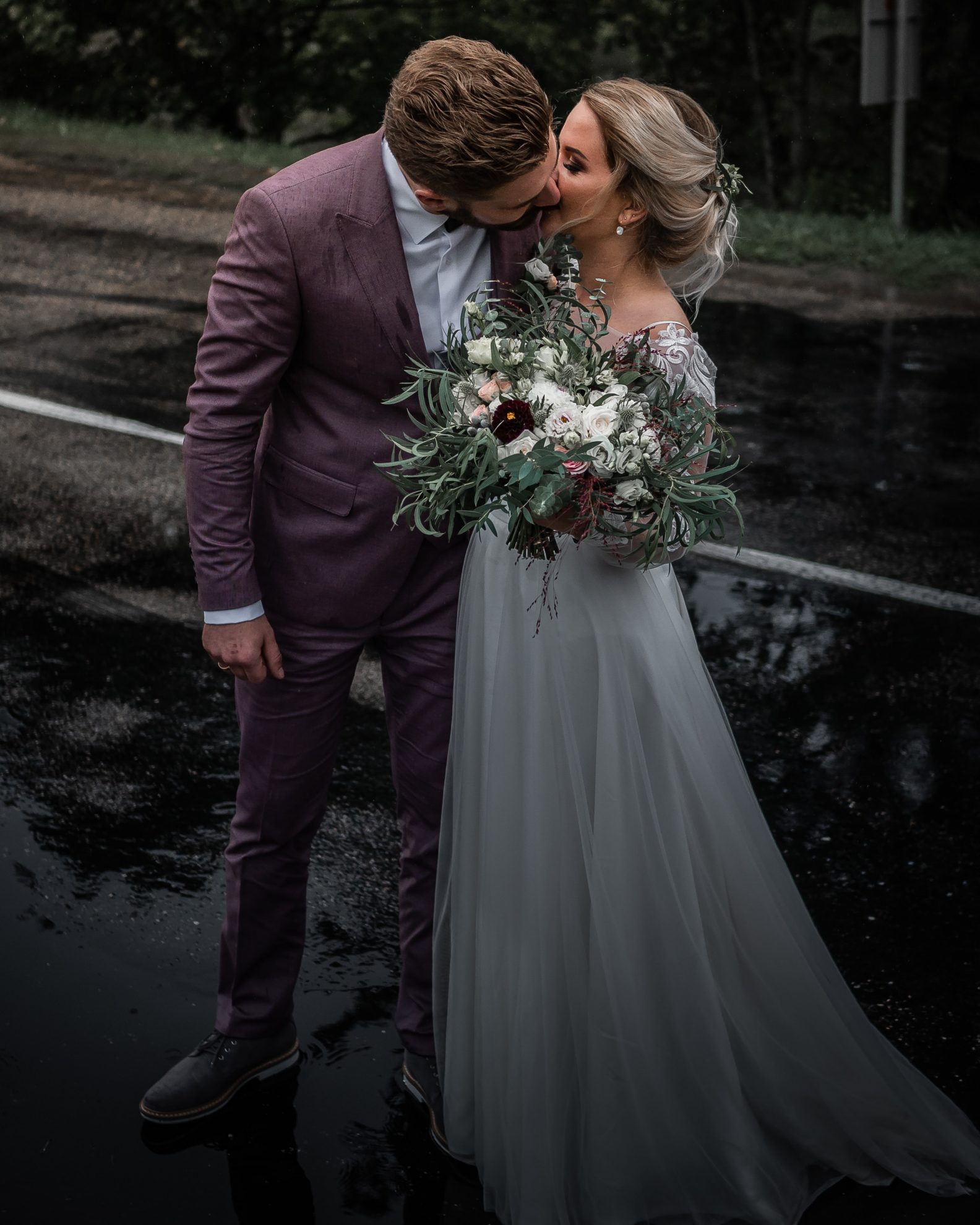 bride and groom kissing