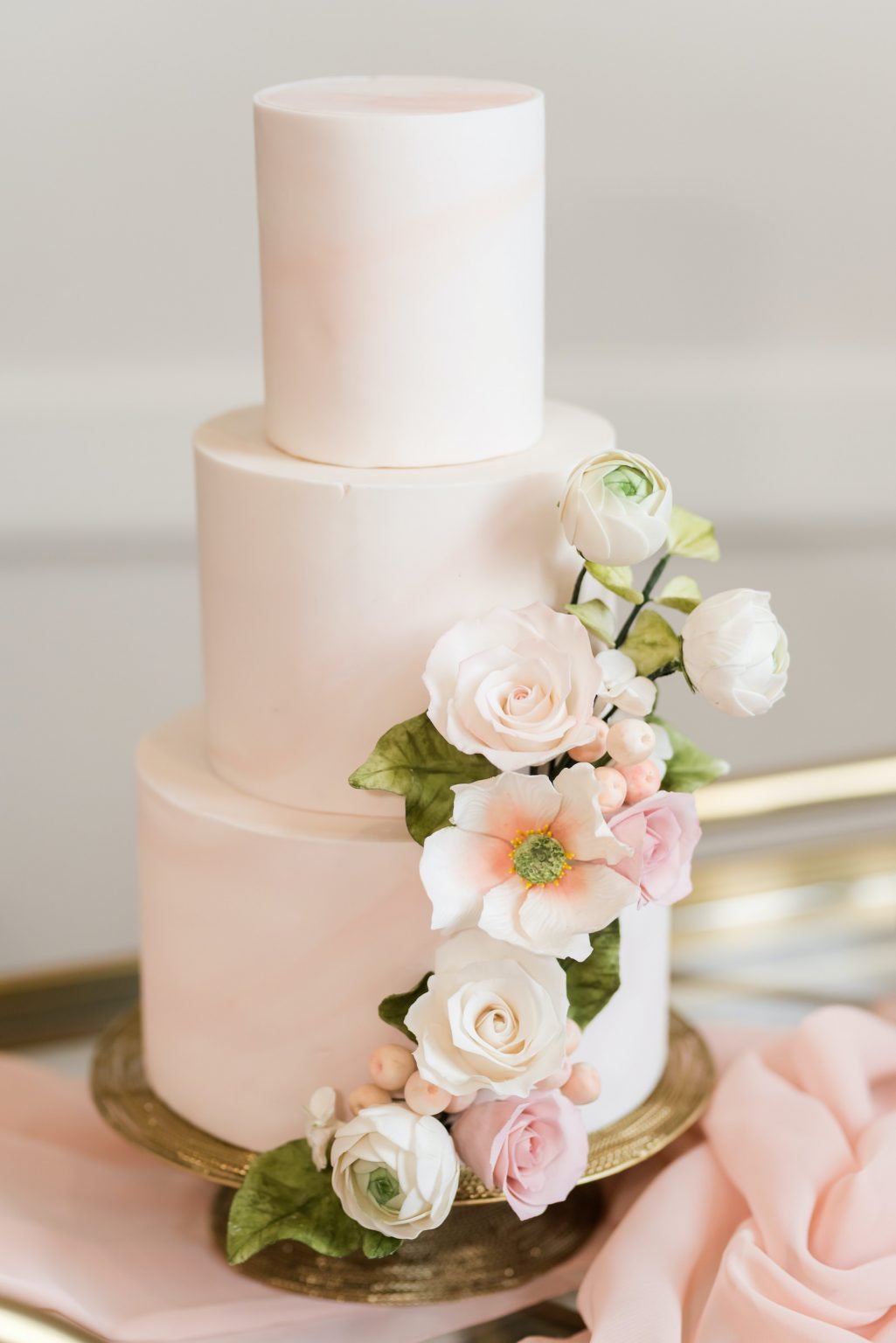How much is a three tier wedding cake?