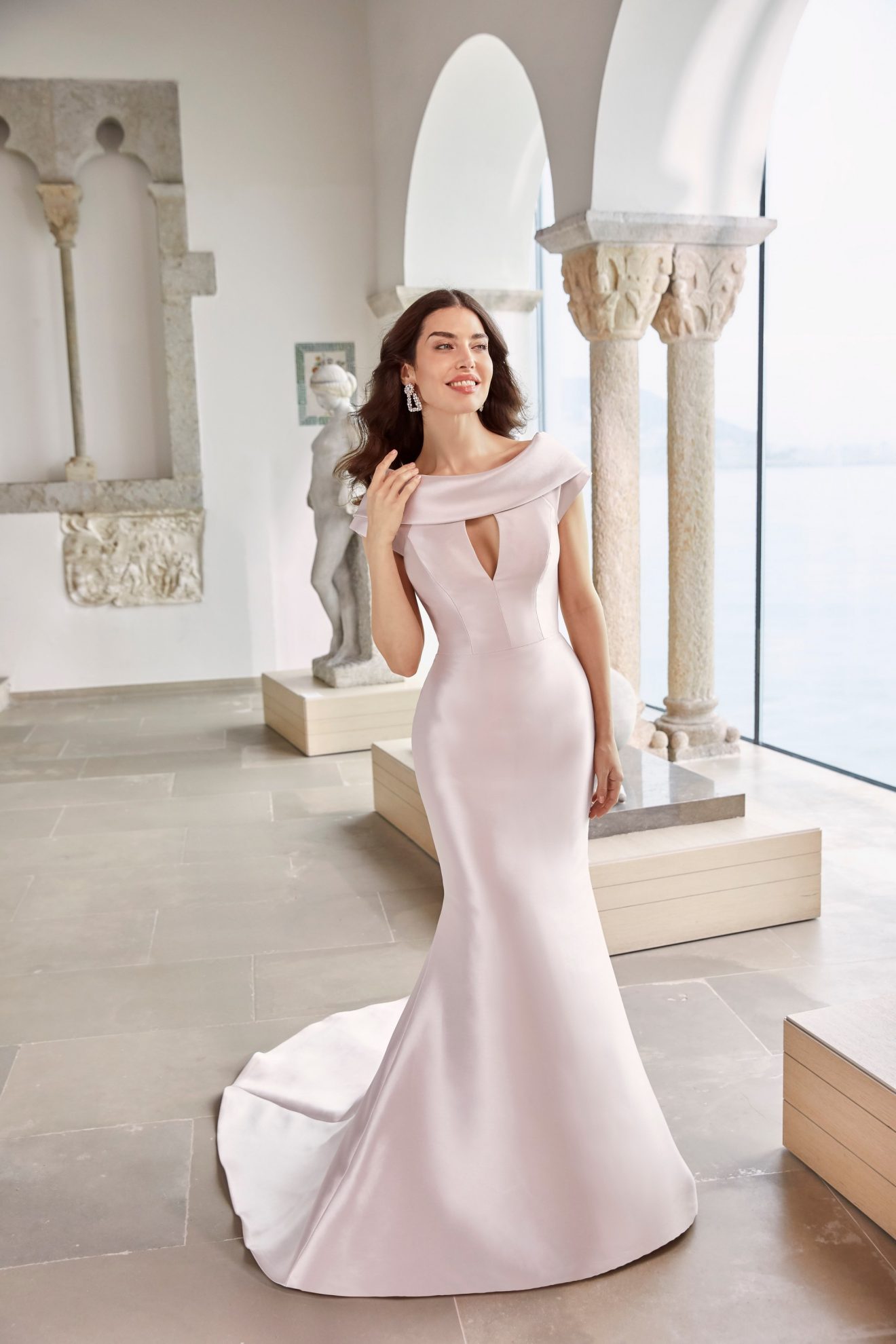 this image shows the floretta wedding dress by ronald joyce which showcases wedding dress trends such as daring cut-outs