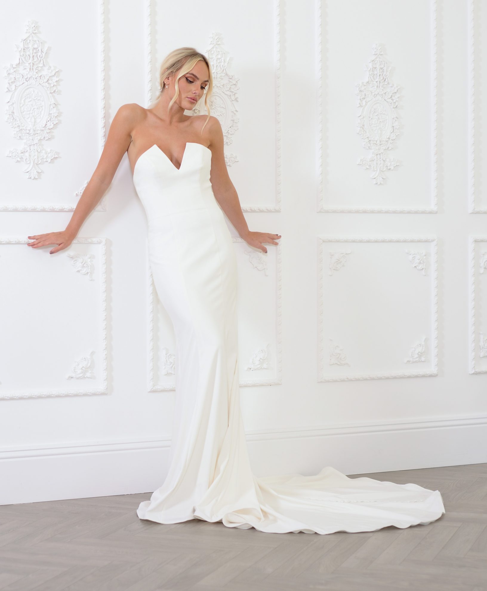 this image shows the Lucia wedding dress by Gaia Bridal which showcases wedding dress trends such as sexy silhouettes 