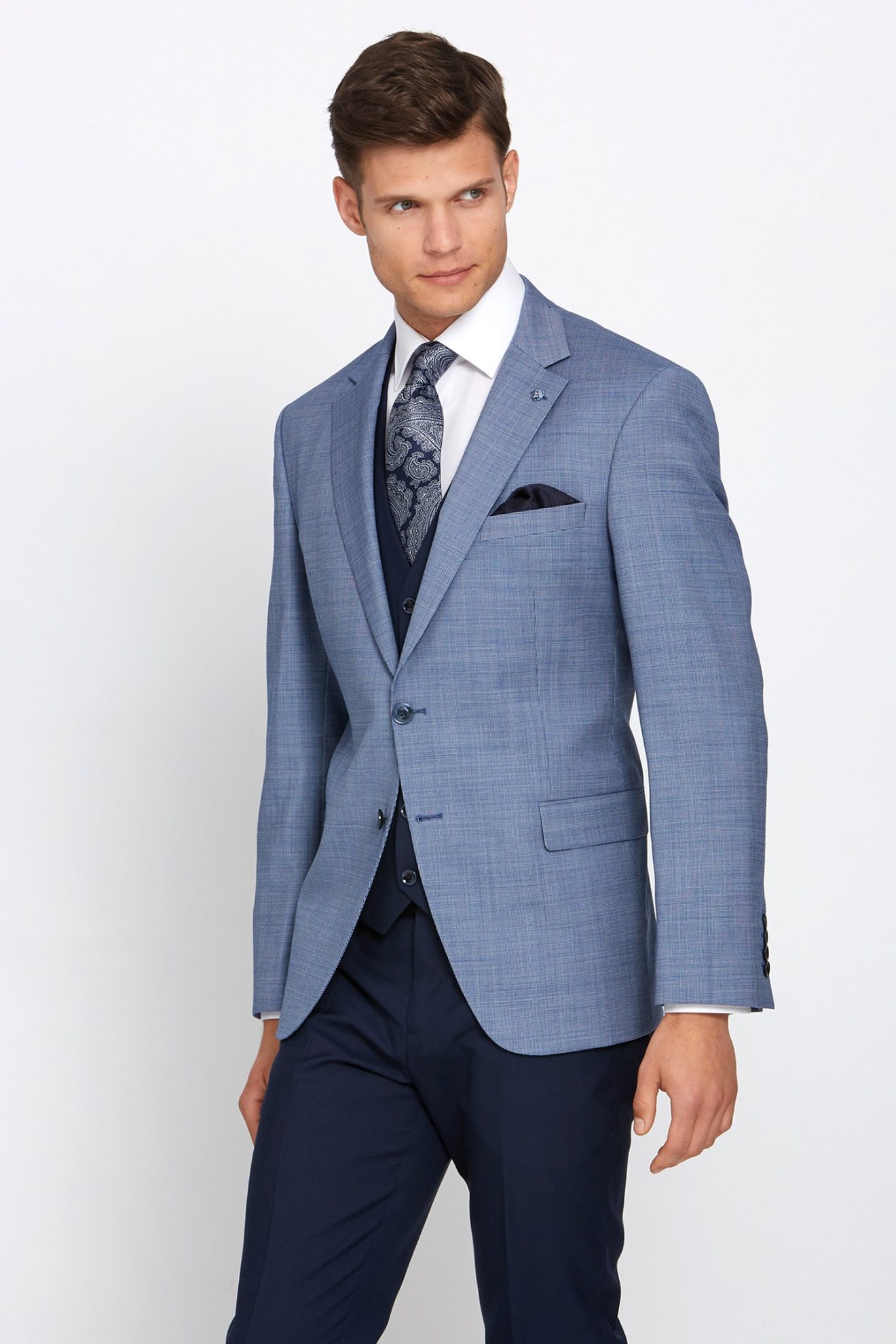 Image of a male model wearing a Benetti suit.