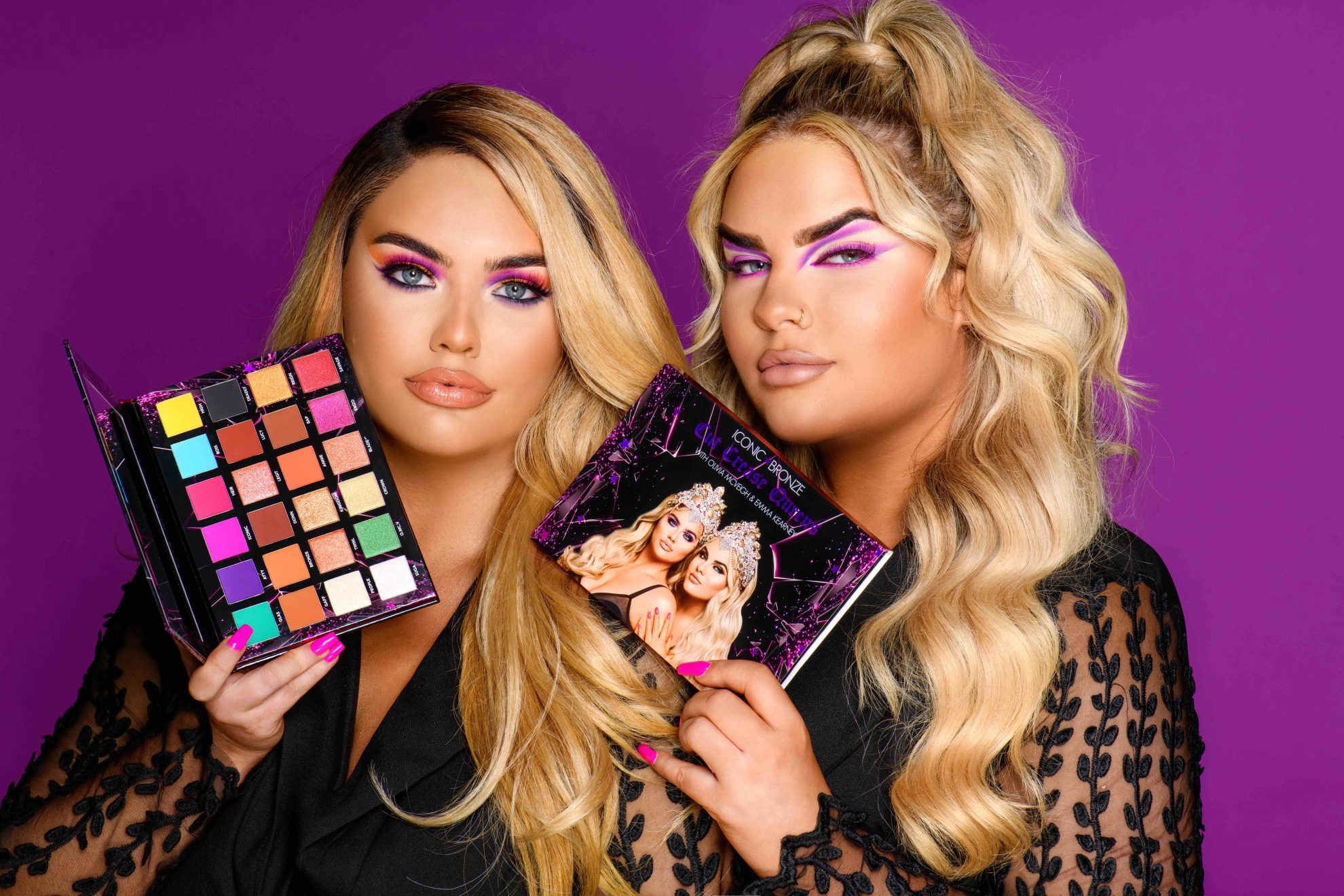 This image shows Olivia McVeigh & Emma Kearney holding their new Cut Crease Queens eye shadow palette.