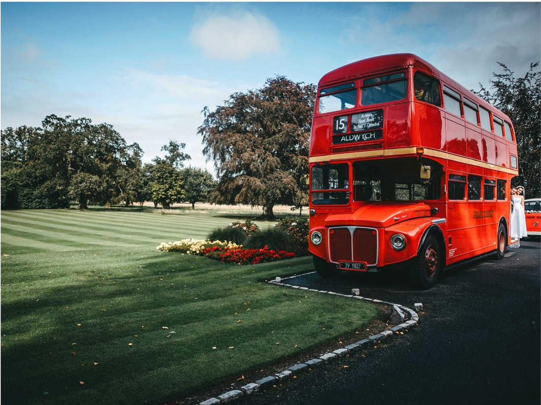 A red double-decker bus. Image used in the What Type Of Wedding Transport Suits Your Personality article.