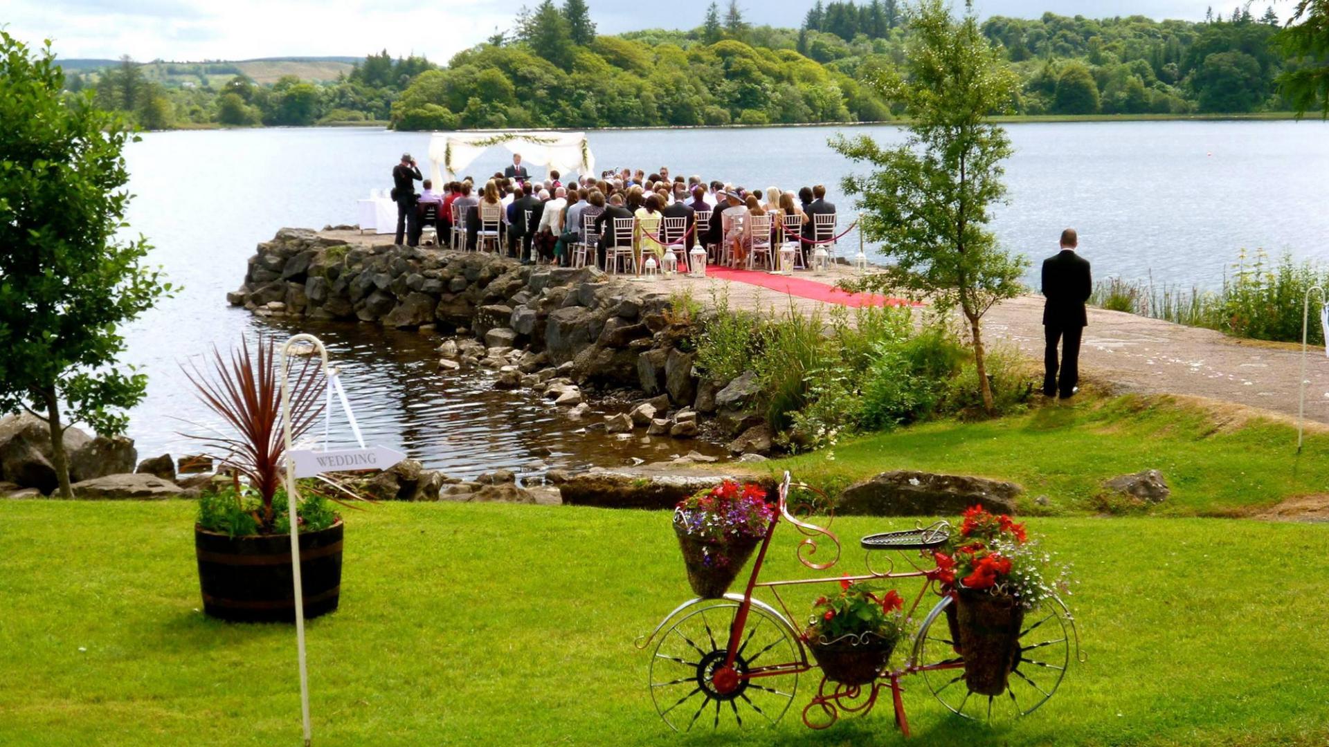 An outdoor wedding ceremony at Harvey's Point.