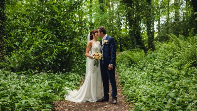 Bride and groom at Mount Falcon Estate. Image featured in the Outdoor Wedding Venues In Ireland for Spring / Summer article.
