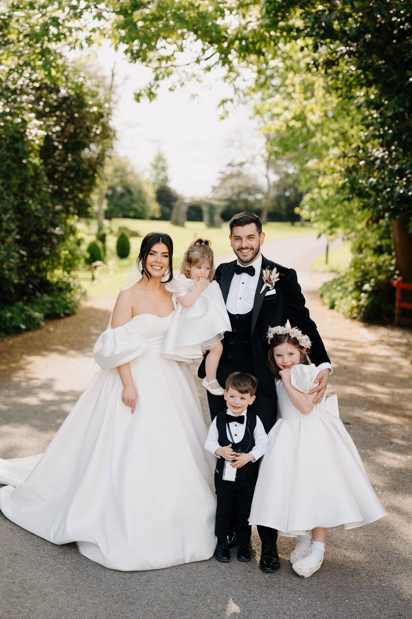 Influencer Roisin Doherty and Nick Irvine with children on their wedding day