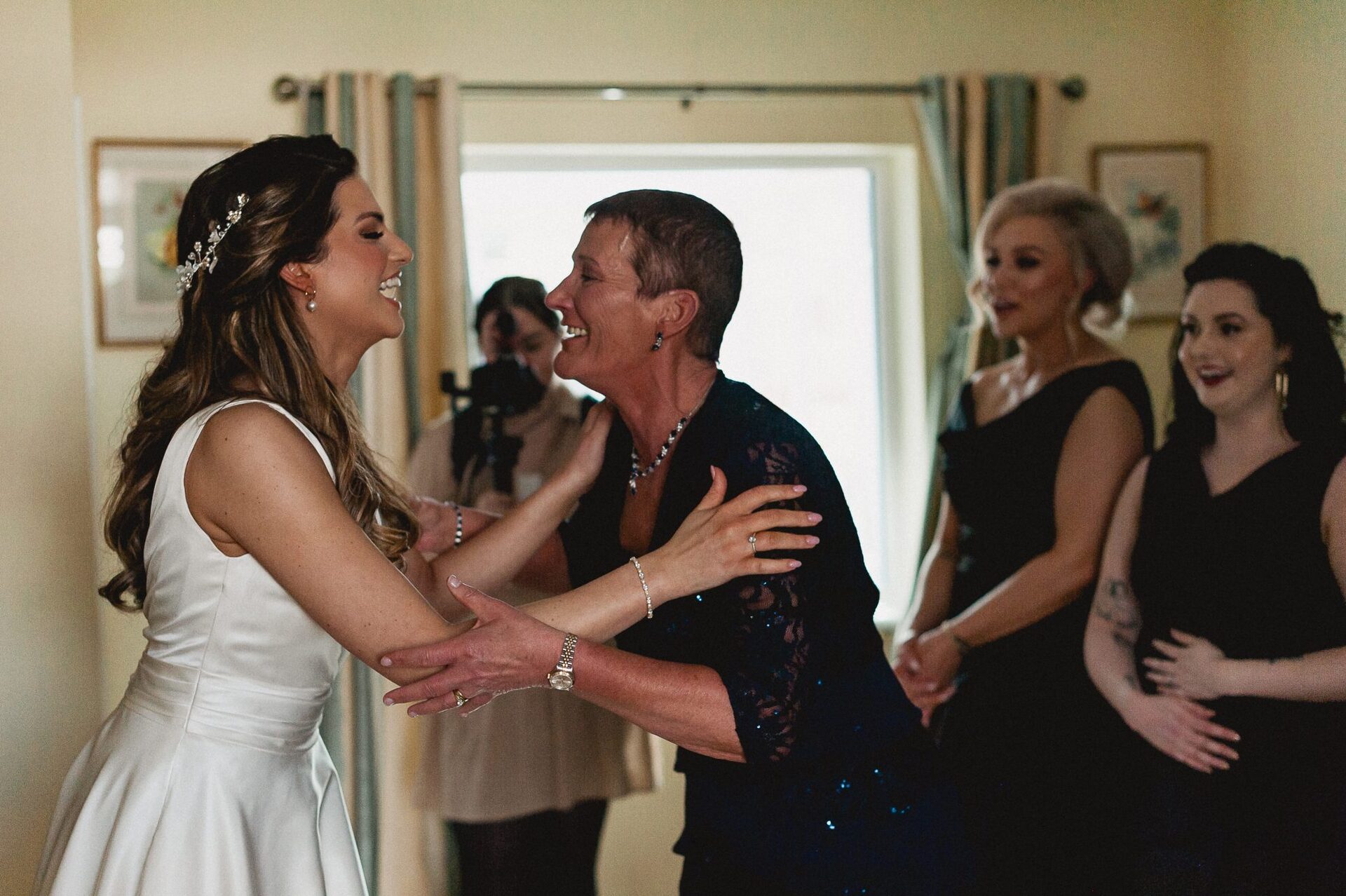 Jordan with her mum and bridesmaids on her wedding day