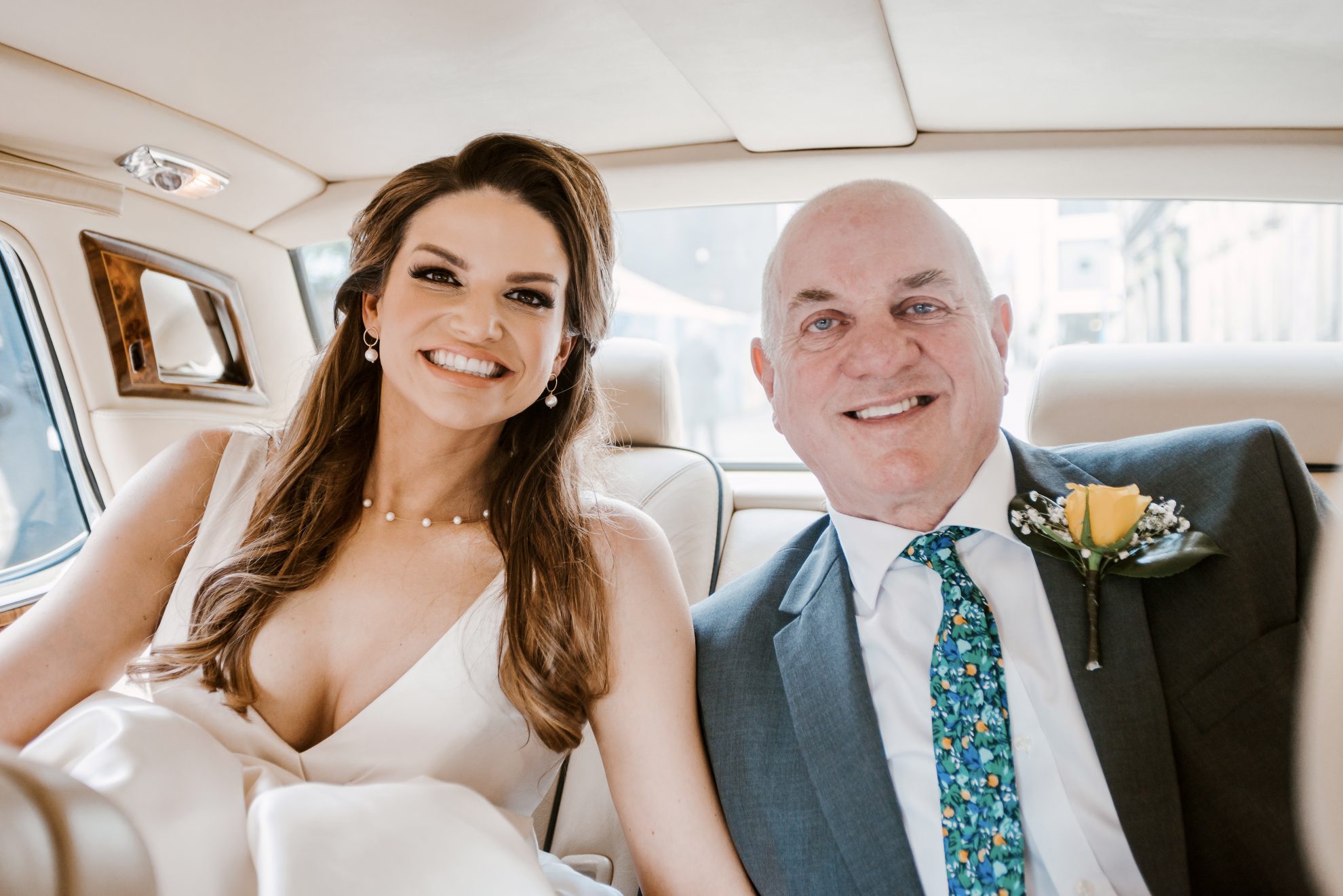 Jordan and her dad in the wedding car