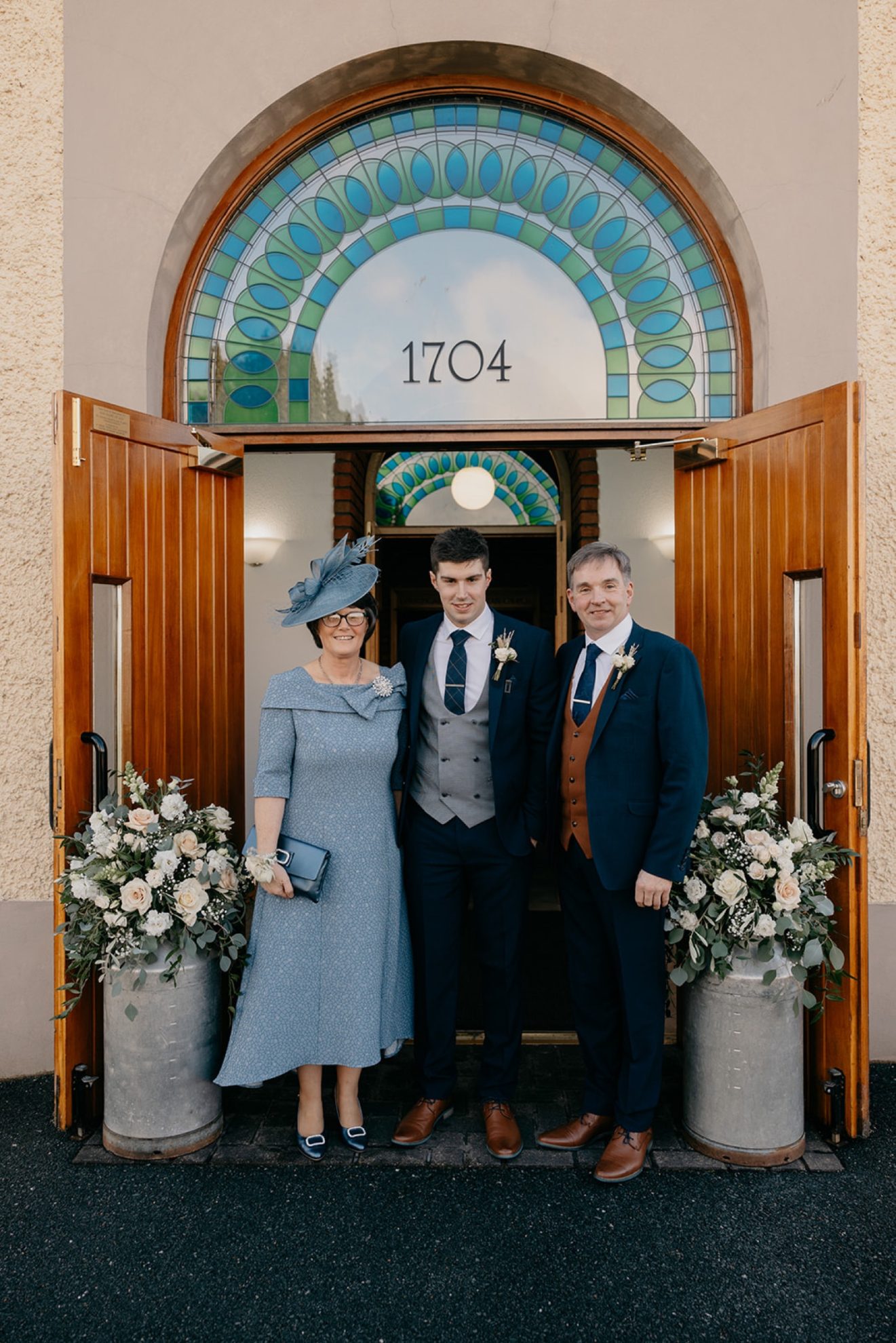 Ian with his parents on his wedding day