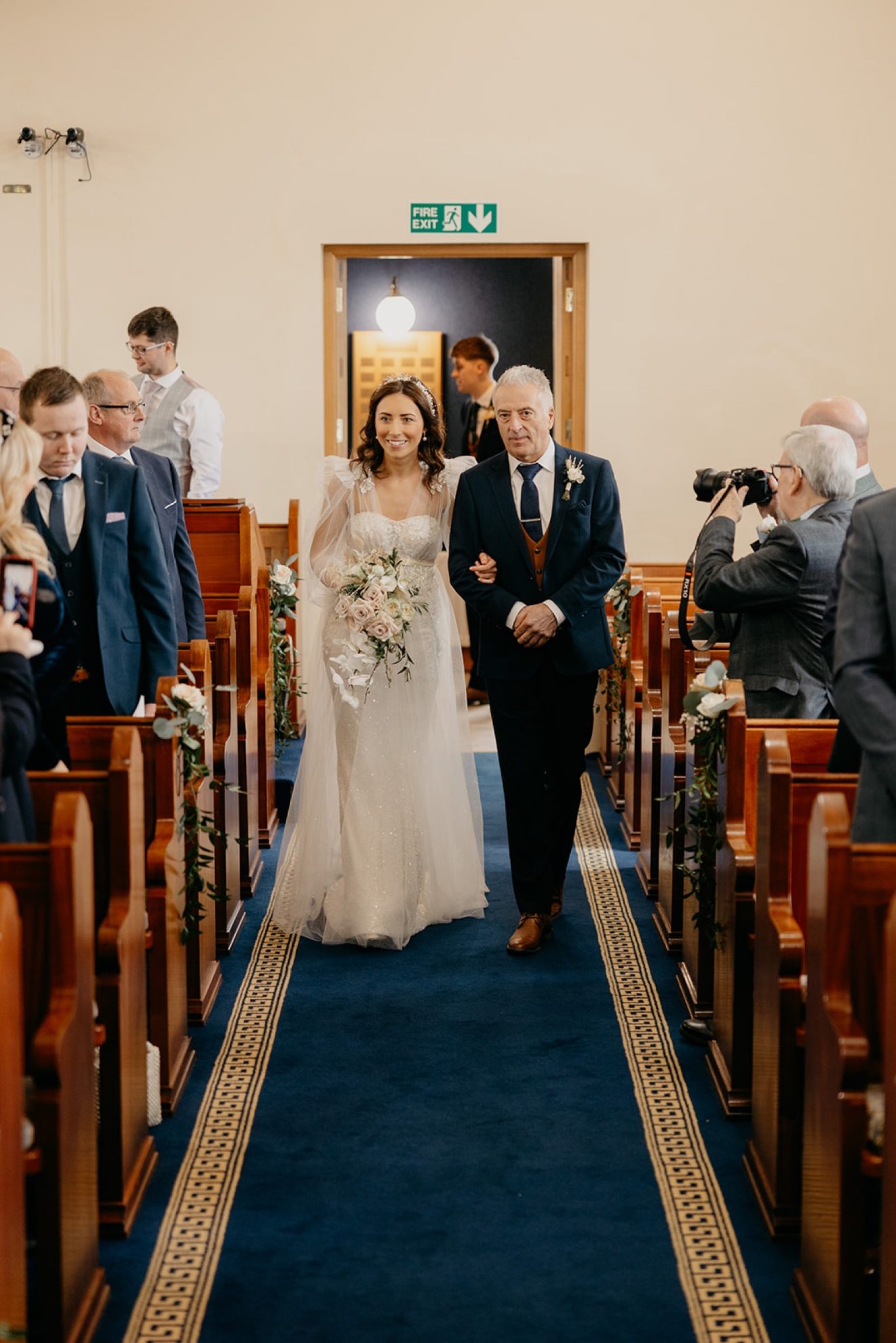 Joanne walking down the aisel with her dad to marry Ian