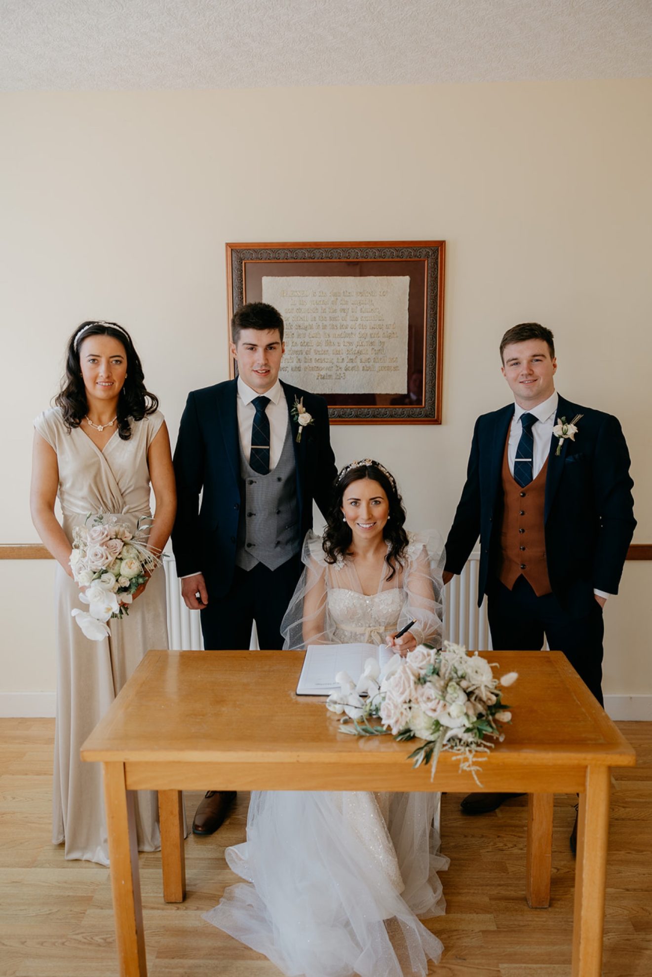 Joanne and Ian signing the register on their wedding day