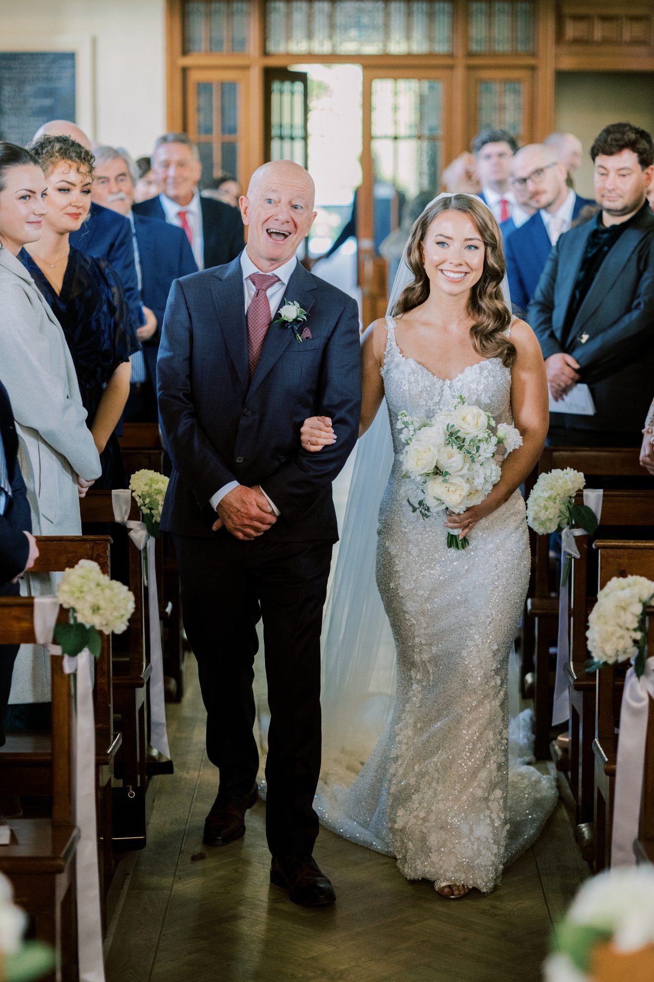 Jean walking down the aisle with her dad