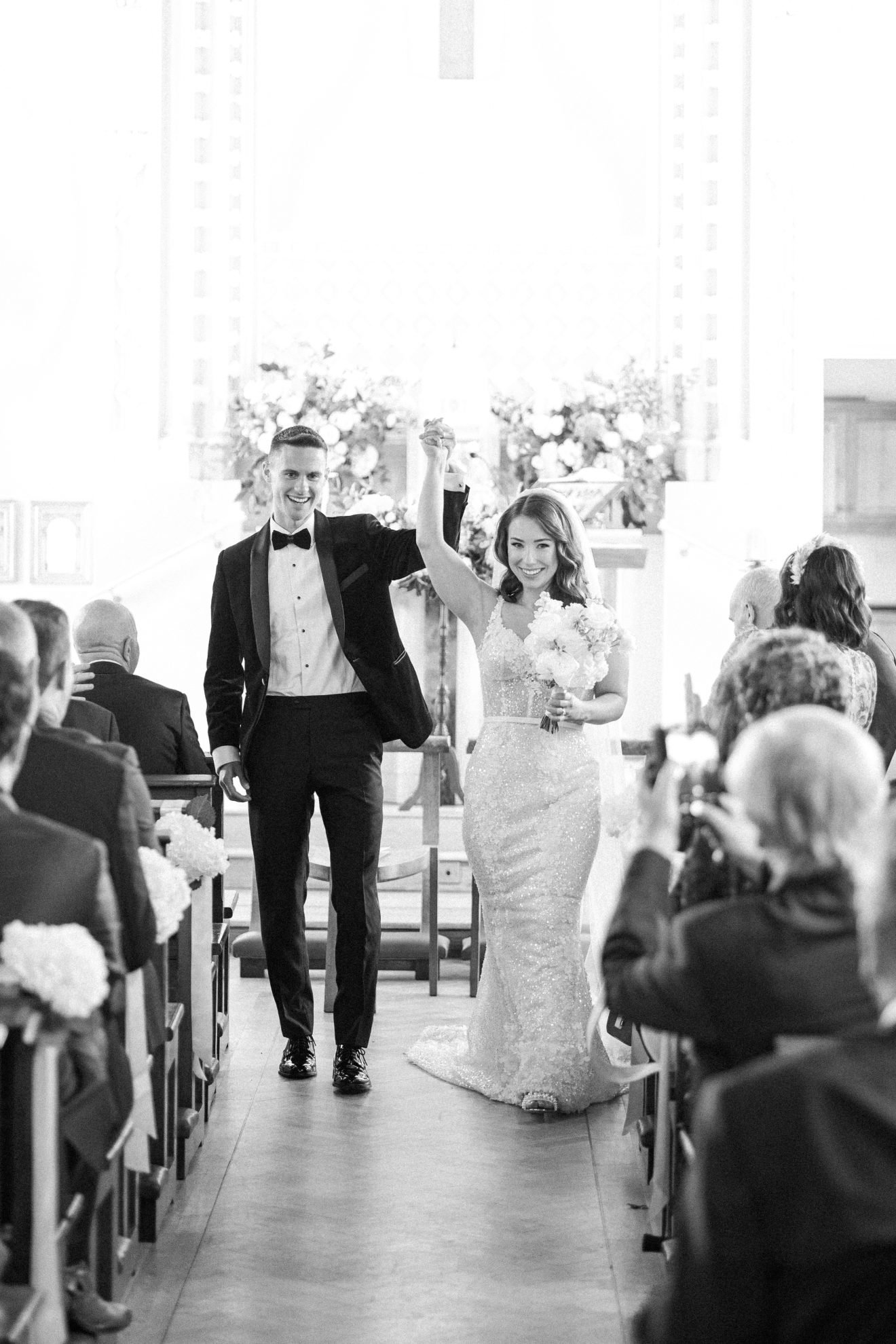 Jean and Fintan walking up the aisle after ceremony