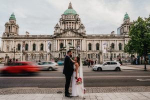 Jael and Greg outside Belfast City Hall on their wedding day