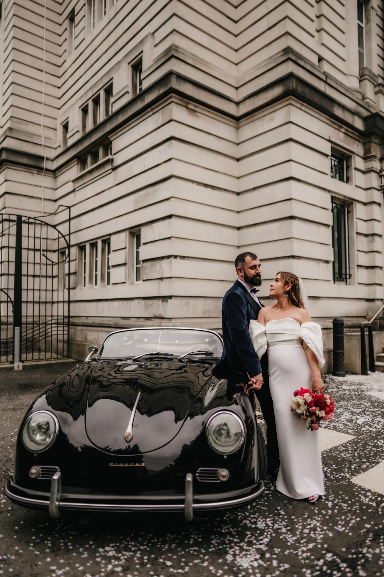 Jael and greg at their wedding car