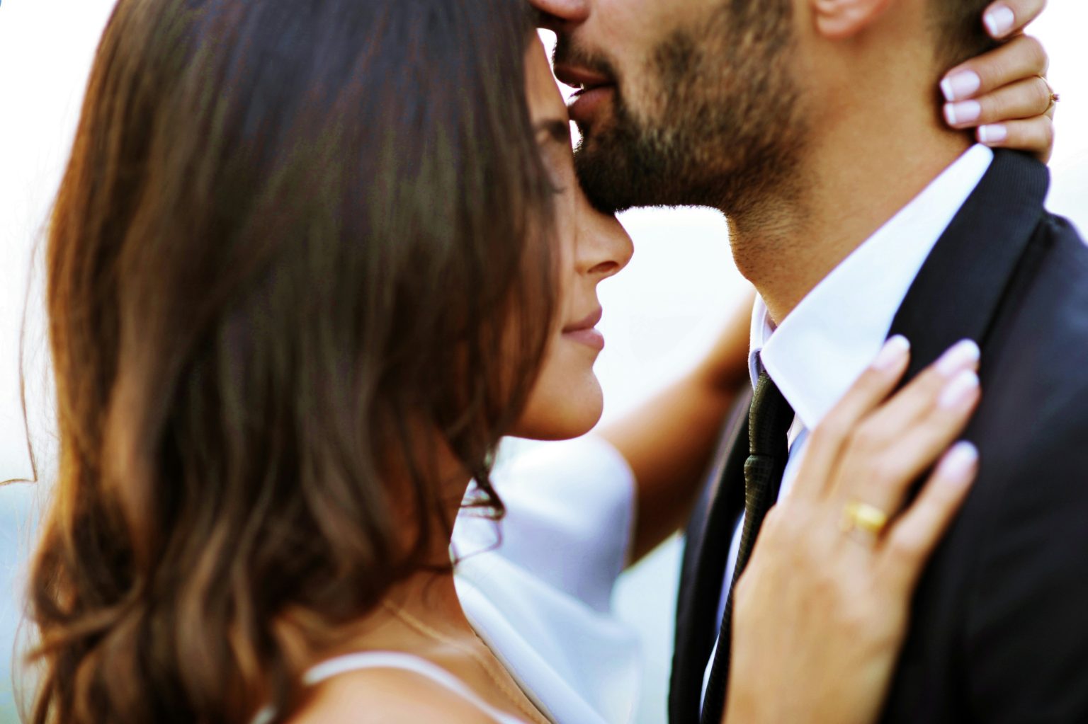 Bride and groom enjoying first dance at wedding