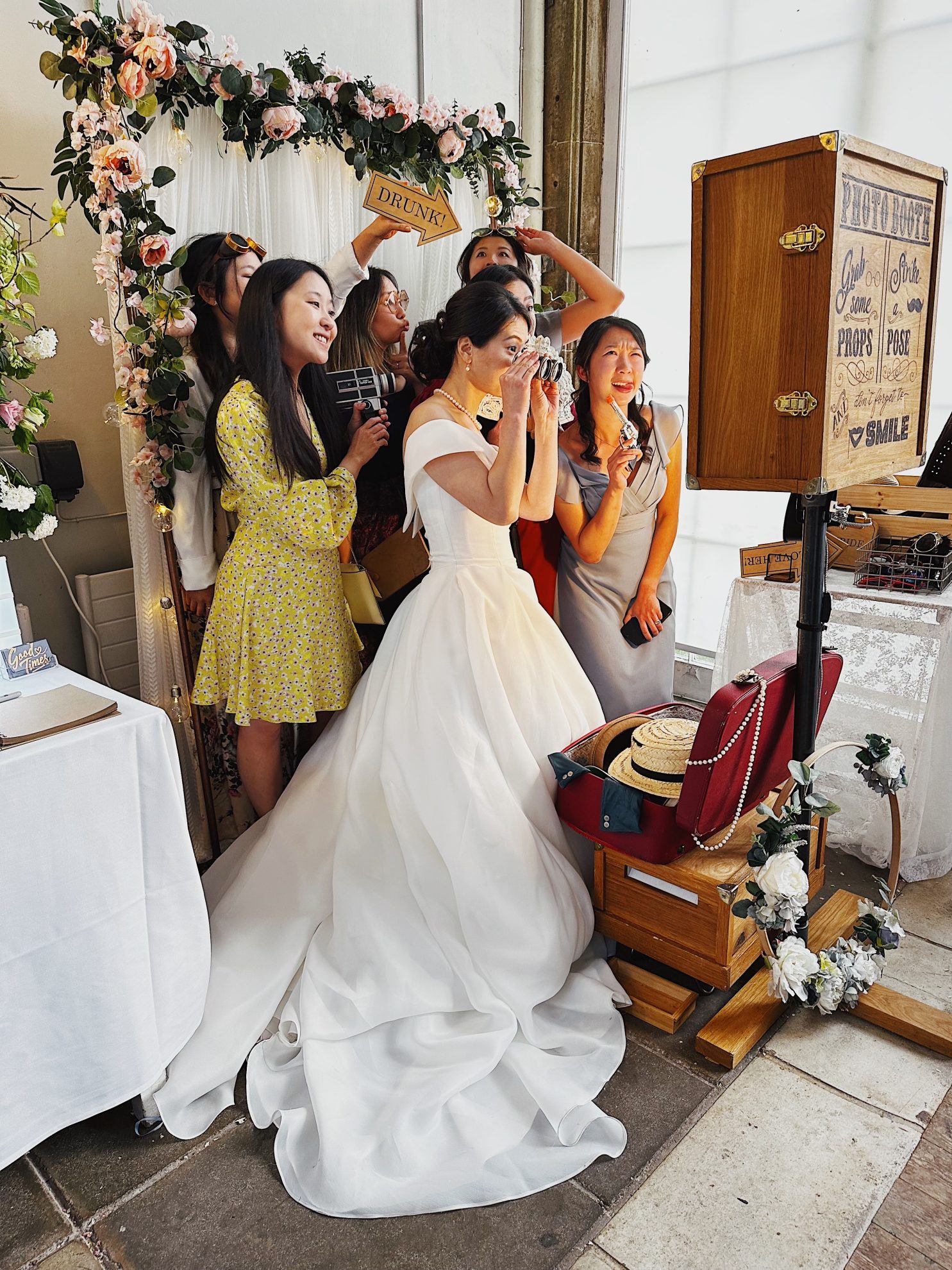 a vintage photobooth at a wedding is an entertaining idea