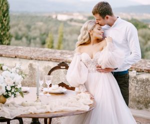 Fairytale wedding - bride and groom embrace