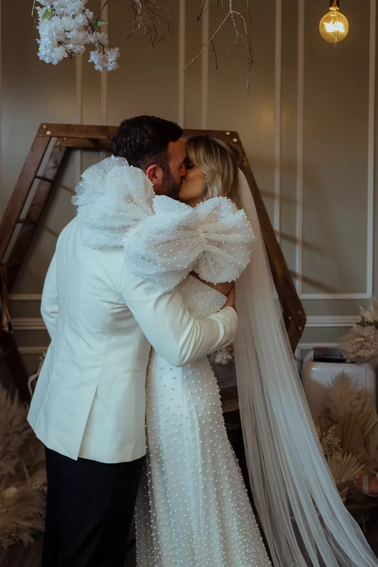 Dominique and Paddy kissing
on their wedding day
